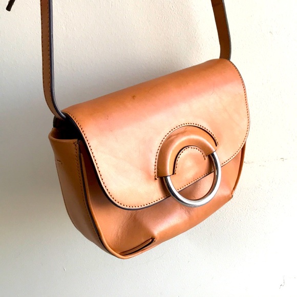 Banana Republic Handbags - Banana Republic Mini Saddle Bag in Natural Leather Flap close magnetic snap